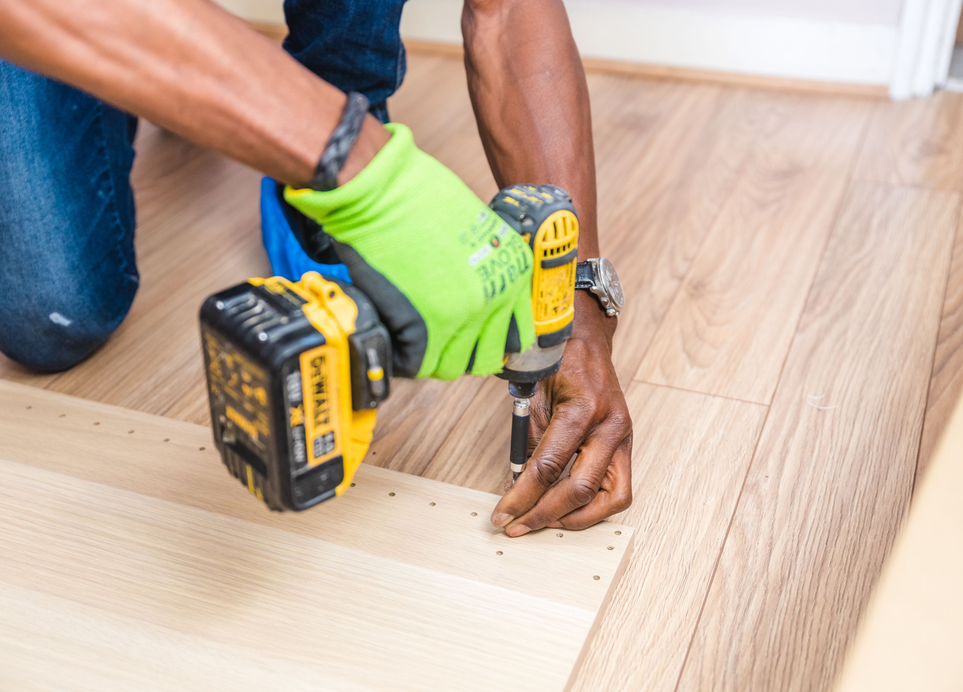 Handyman using a cordless drill on the job
